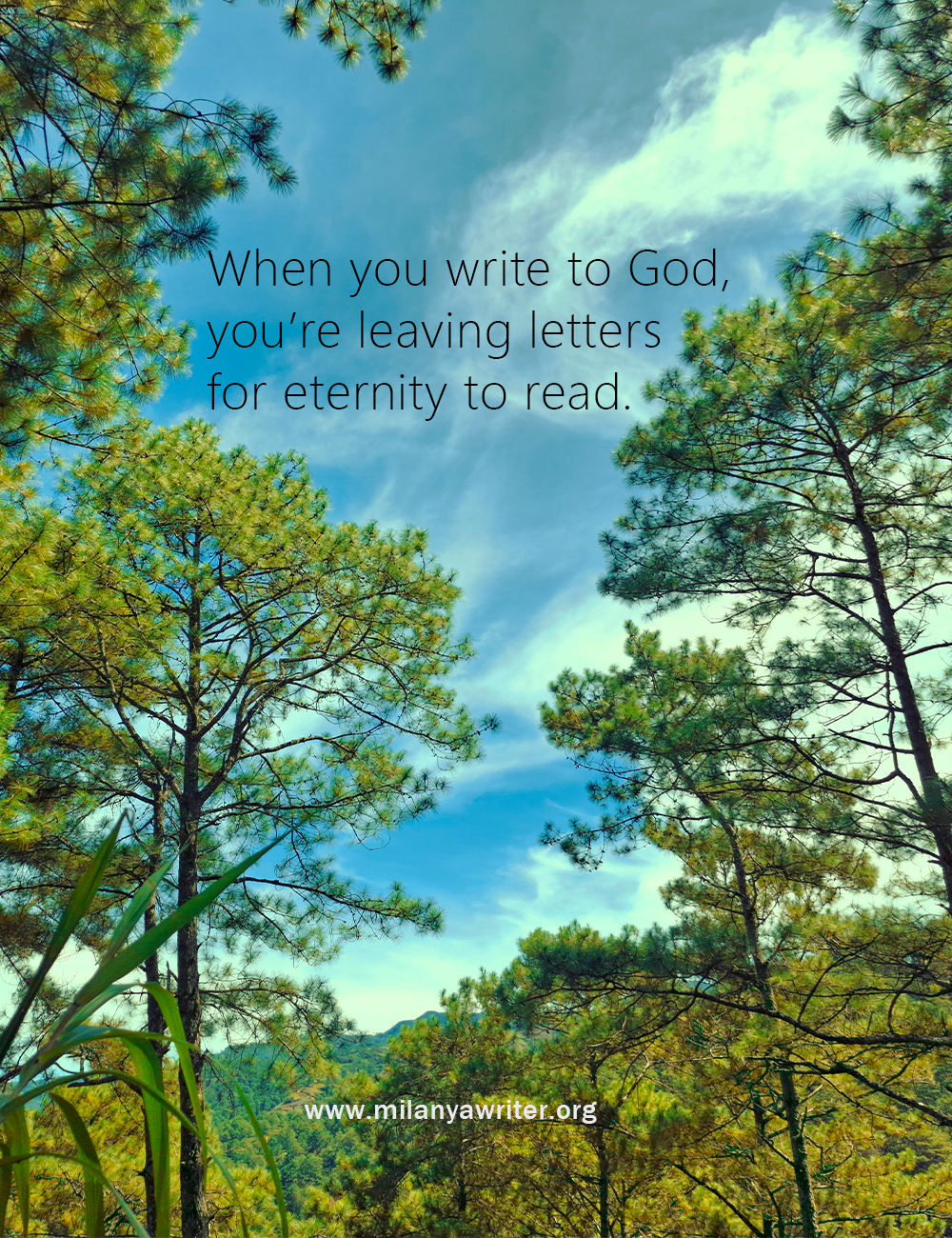 hands writing in journal on a mountain with tree and clear blue sky, words: “When you write To God, you’re leaving letters for eternity to read”