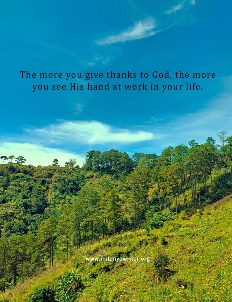 Christian quote: The more you give thanks to God, the more you see His hand at work in your life” — inspirational faith-based wall art with mountains and clear sky background.